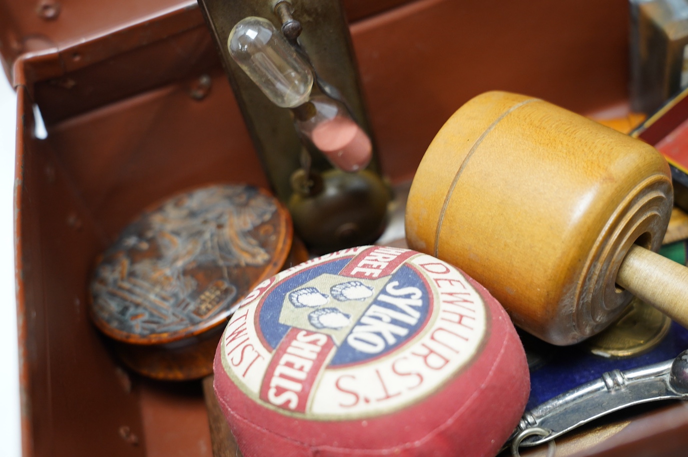 A quantity of 19th century and later collectables to include a circular burr wood snuff box, framed medals, a tortoiseshell snuff box and sundries. Condition - fair
